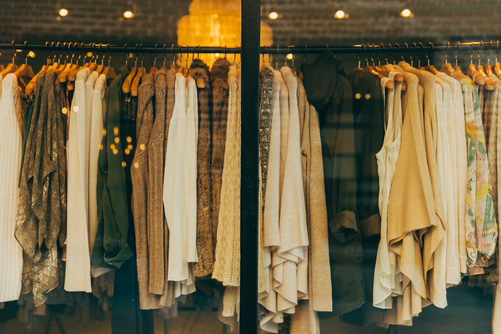 A warm boutique window at dusk on a London street